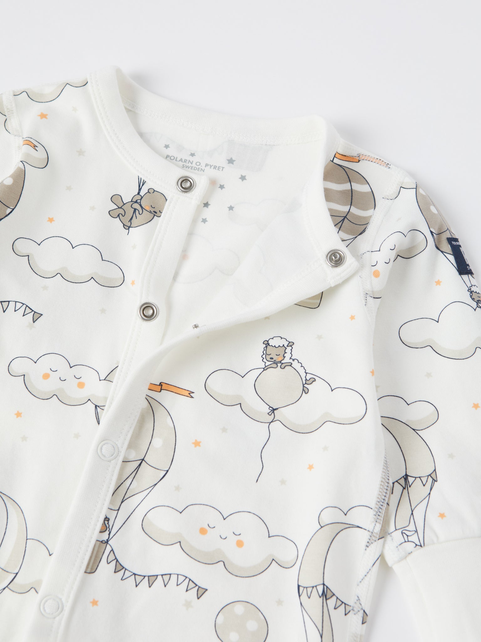 Balloon Print Baby Sleepsuit from the Polarn O. Pyret baby collection. Clothes made using sustainably sourced materials.