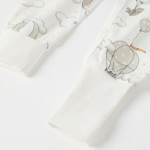 Balloon Print Baby Sleepsuit from the Polarn O. Pyret baby collection. Clothes made using sustainably sourced materials.