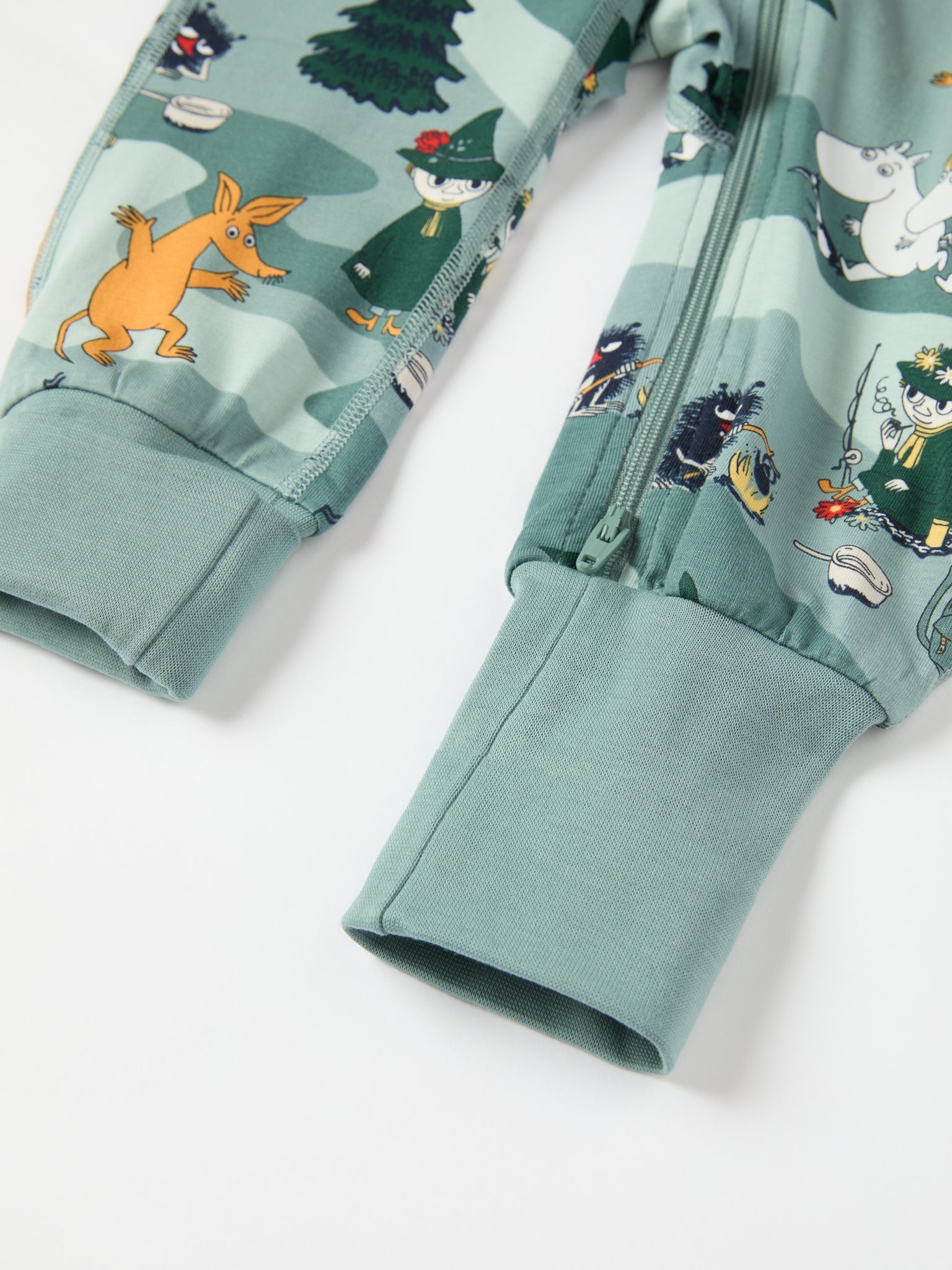 Moomin Print Baby Sleepsuit from the Polarn O. Pyret baby collection. Nordic kids clothes made from sustainable sources.