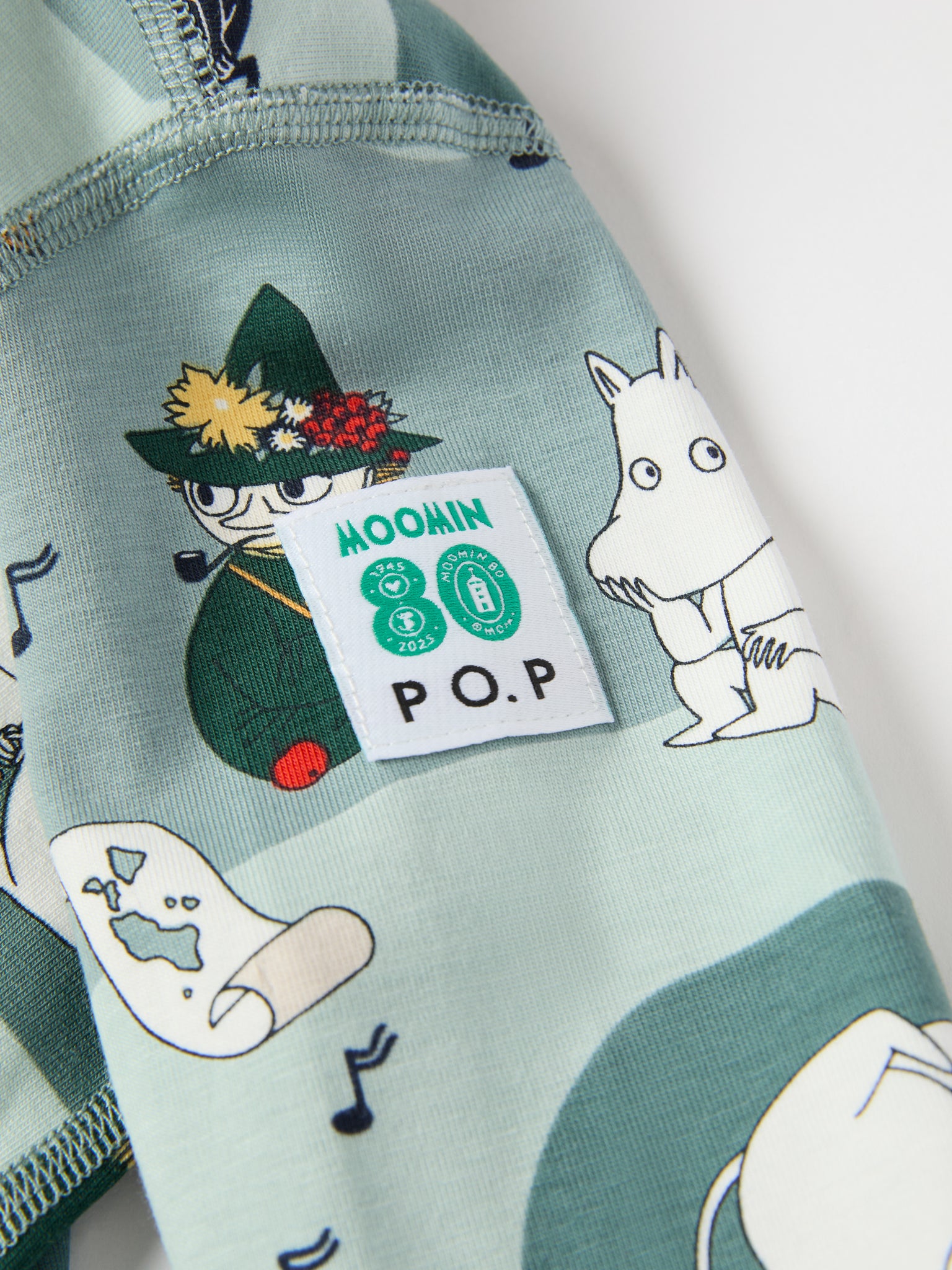 Moomin Print Baby Sleepsuit from the Polarn O. Pyret baby collection. Nordic kids clothes made from sustainable sources.