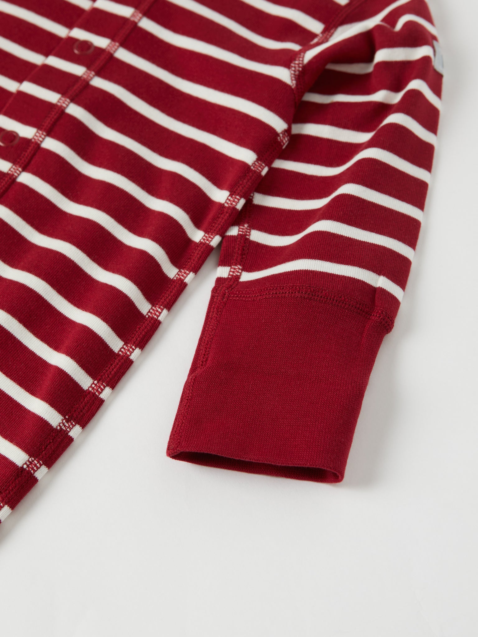 Red Striped Baby Sleepsuit from the Polarn O. Pyret baby collection. Ethically produced kids clothing.