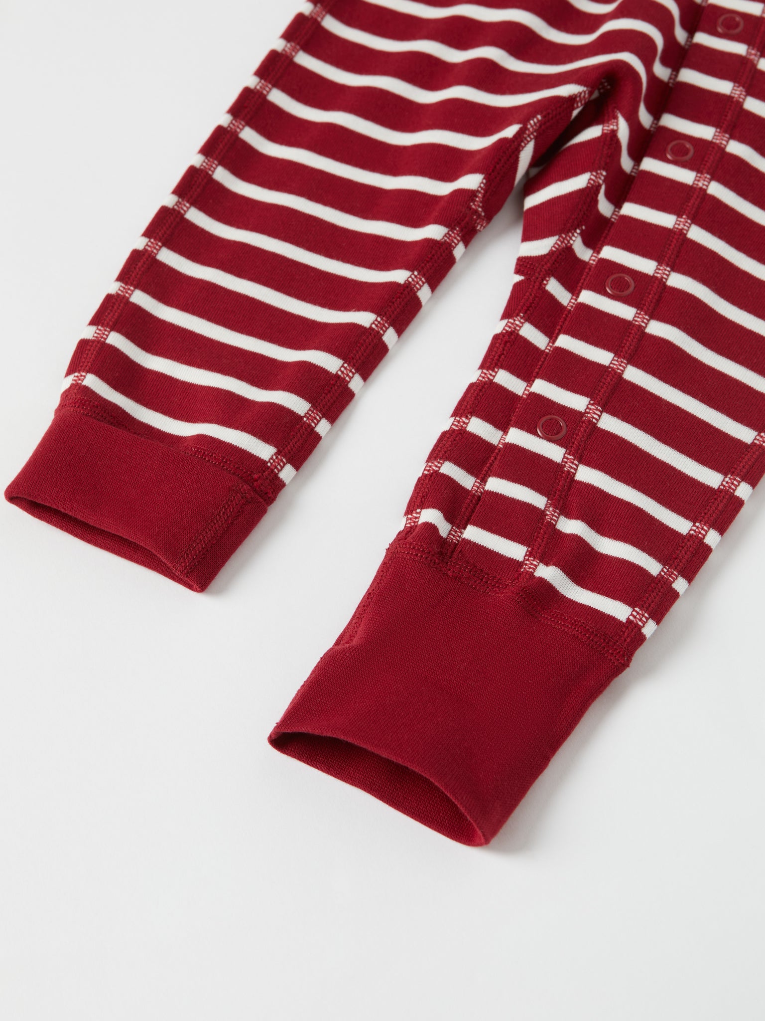 Red Striped Baby Sleepsuit from the Polarn O. Pyret baby collection. Ethically produced kids clothing.