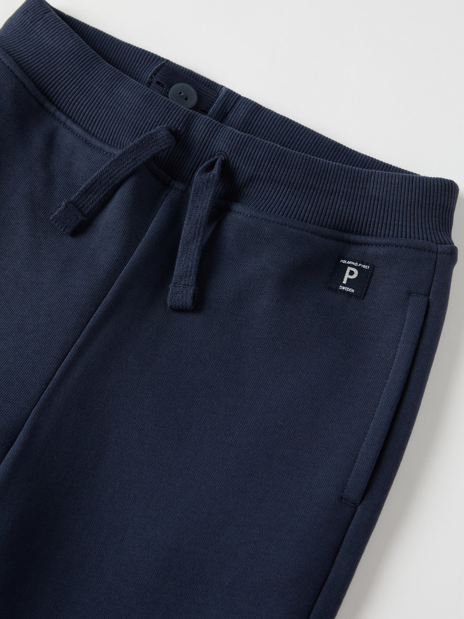 Blue Kids Joggers from Polarn O. Pyret kidswear. Nordic kids clothes made from sustainable sources.