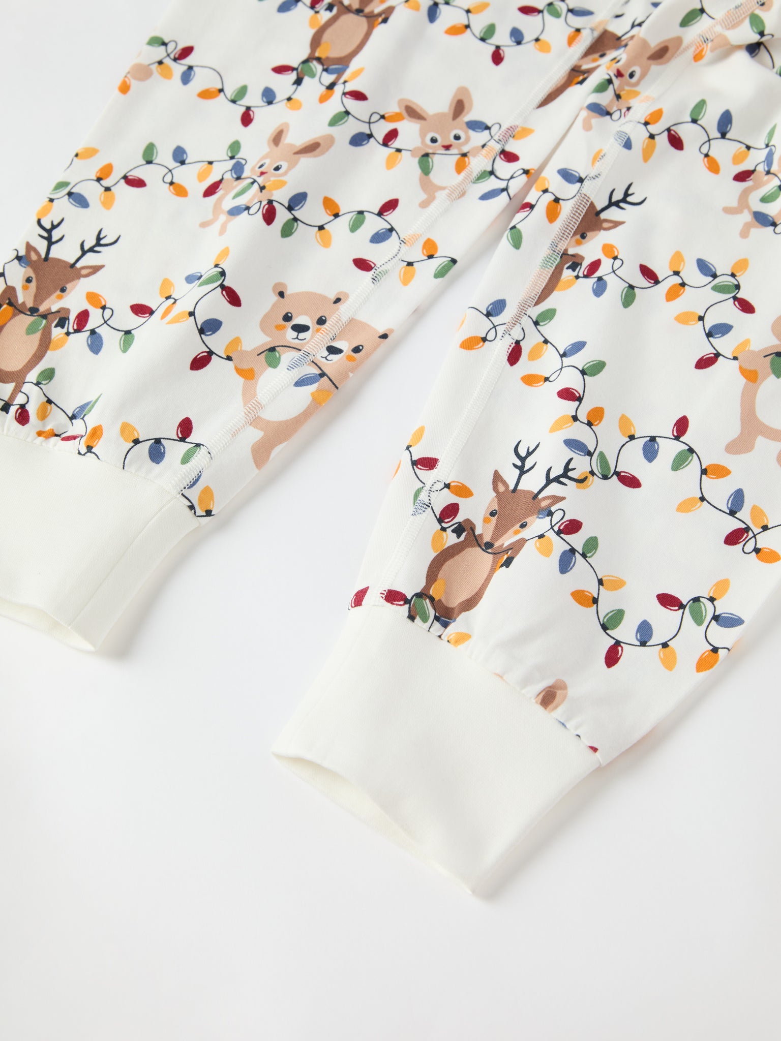 Christmas Lights Print Adult Pyjamas from the Polarn O. Pyret adult collection. Clothes made using sustainably sourced materials.