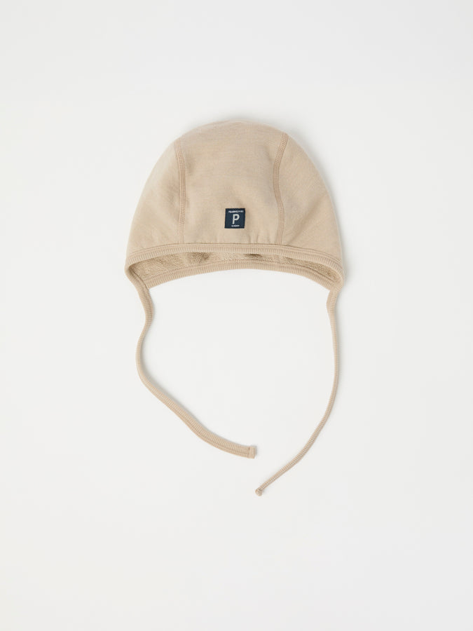 Beige Merino Wool Baby Helmet Hat from the Polarn O. Pyret kidswear collection. Quality kids clothing made to last.