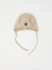 Beige Merino Wool Baby Helmet Hat from the Polarn O. Pyret kidswear collection. Quality kids clothing made to last.