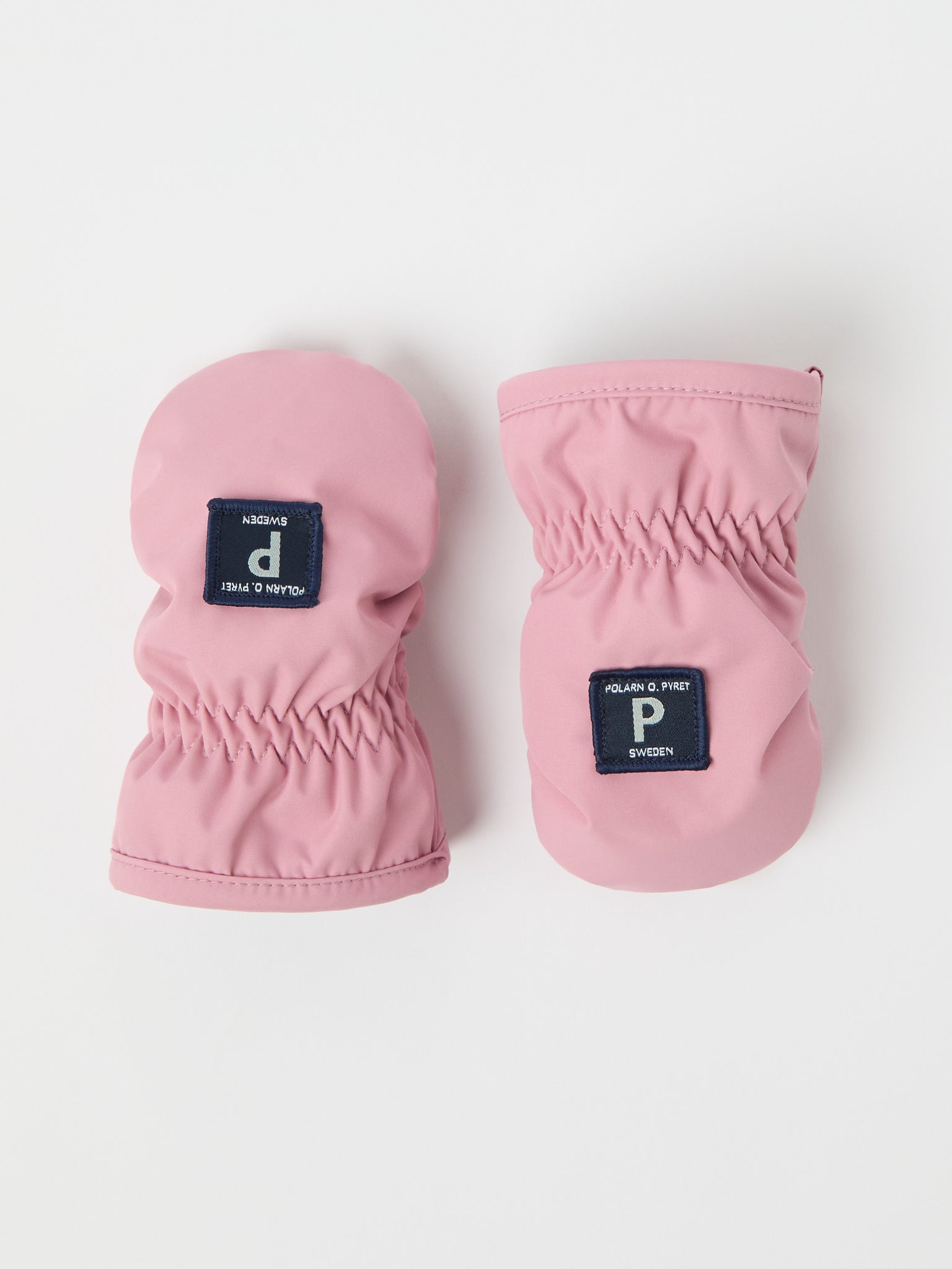 Pink Shell Fleece Lined Baby Mittens from the Polarn O. Pyret kidswear collection. Quality kids clothing made to last.