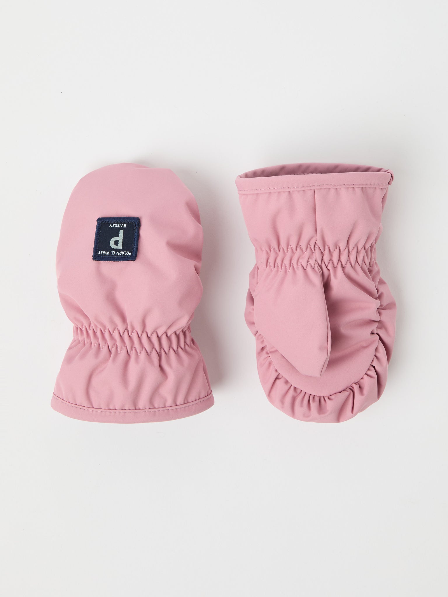 Pink Shell Fleece Lined Baby Mittens from the Polarn O. Pyret kidswear collection. Quality kids clothing made to last.