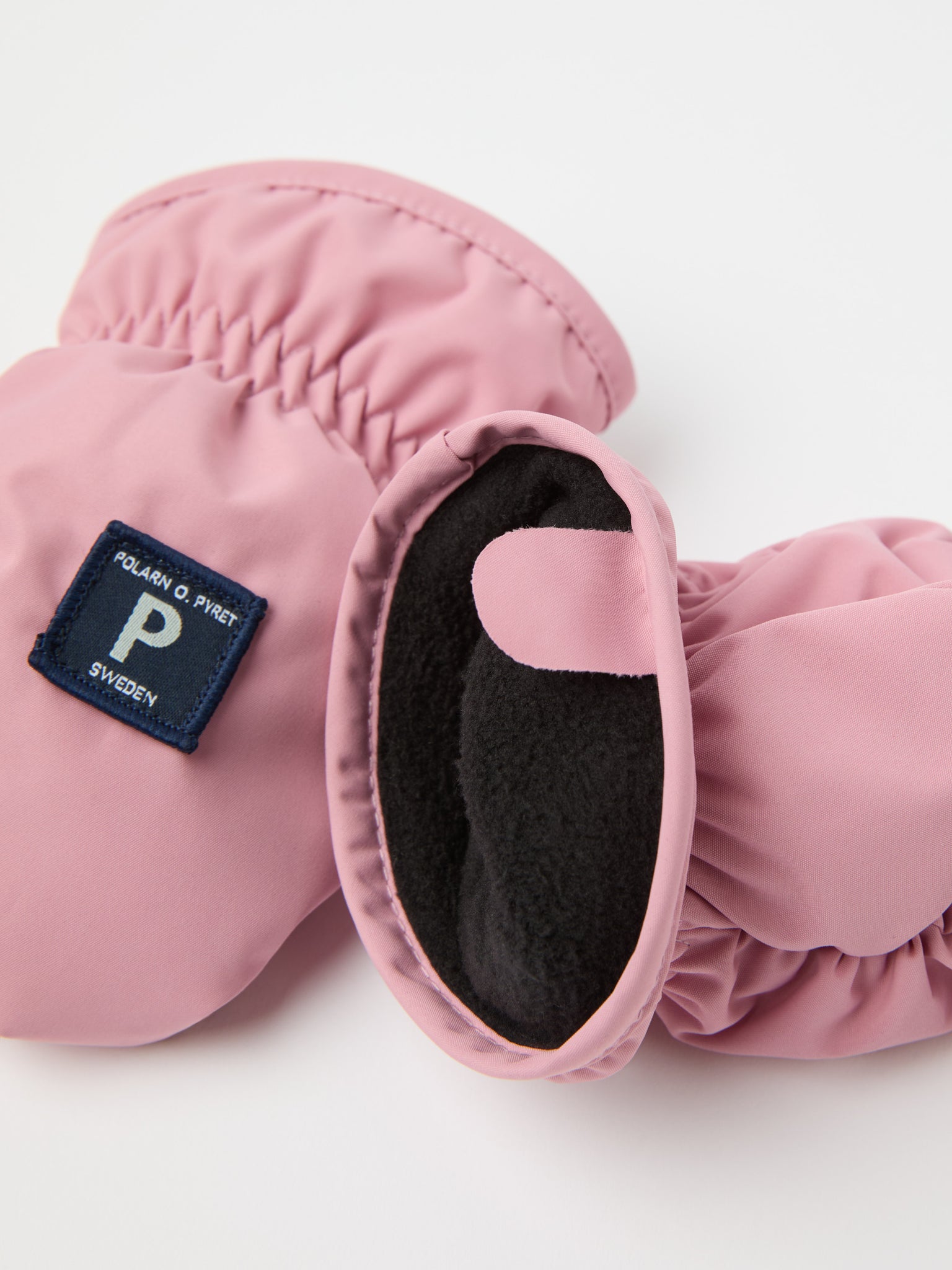 Pink Shell Fleece Lined Baby Mittens from the Polarn O. Pyret kidswear collection. Quality kids clothing made to last.