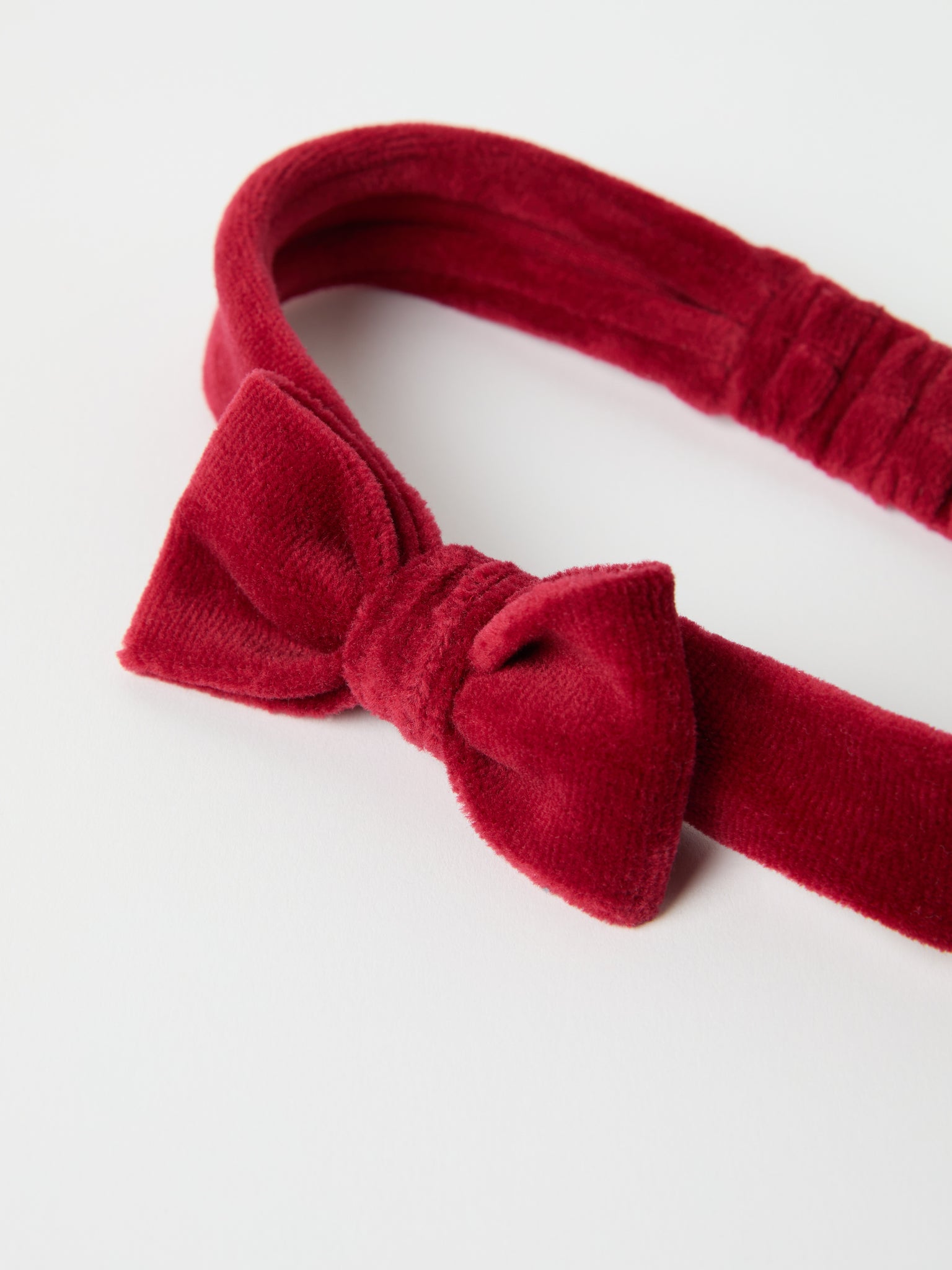 Red Velour Hair Band from the Polarn O. Pyret kidswear collection. Clothes made using sustainably sourced materials.