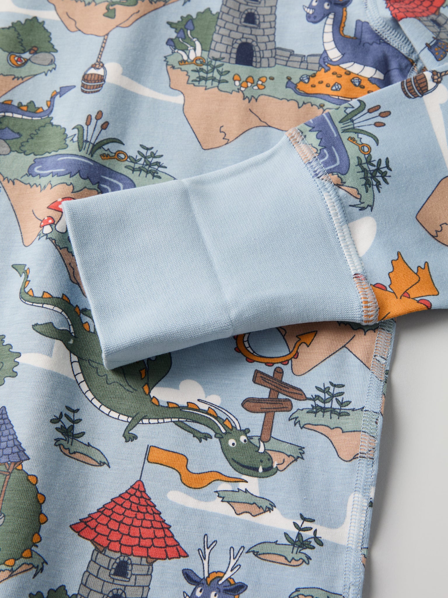 Dragon Print Kids Pyjamas from Polarn O. Pyret kidswear. Ethically produced kids clothing.