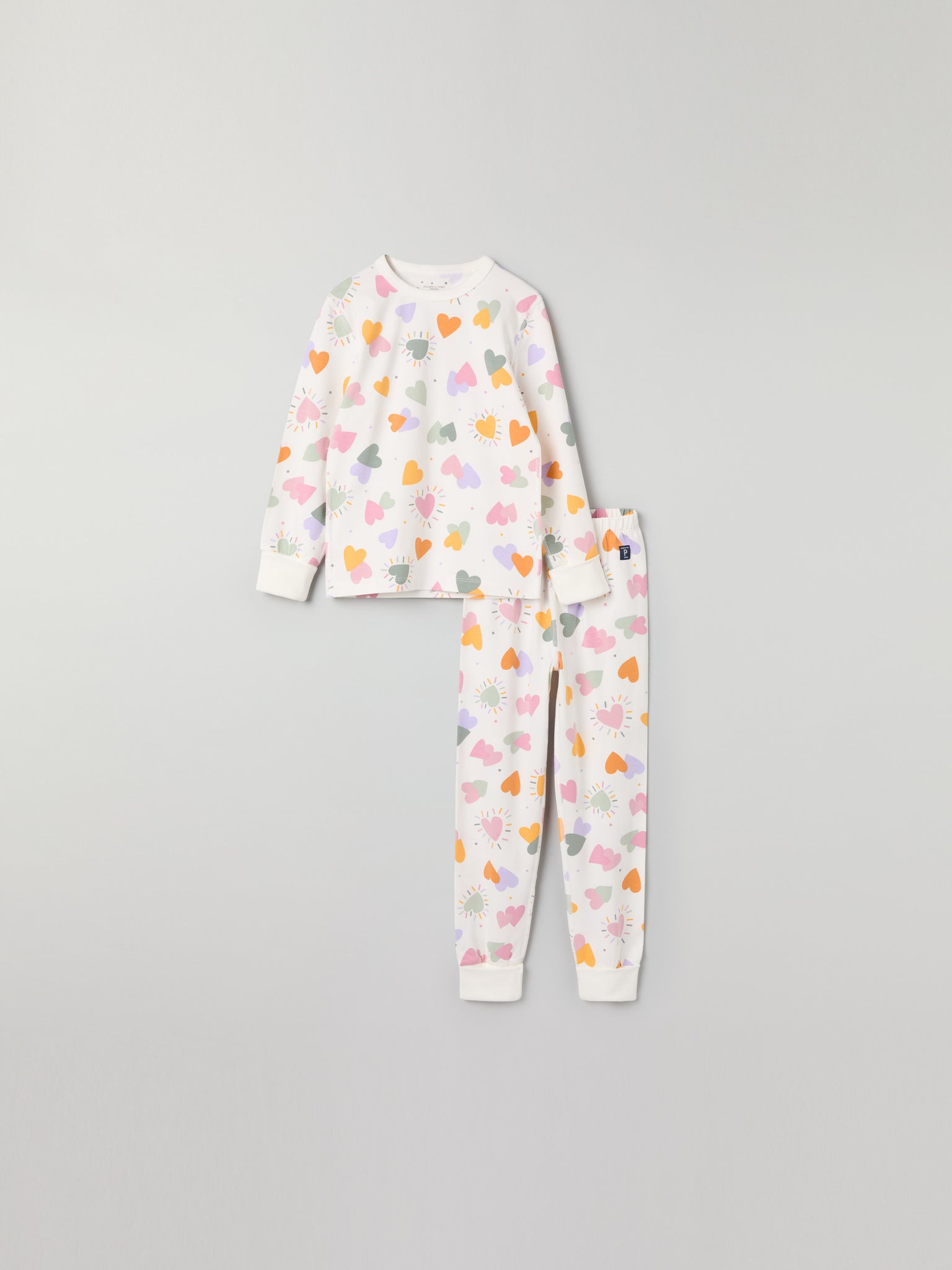 Heart Print Kids Pyjamas from Polarn O. Pyret kidswear. Clothes made using sustainably sourced materials.