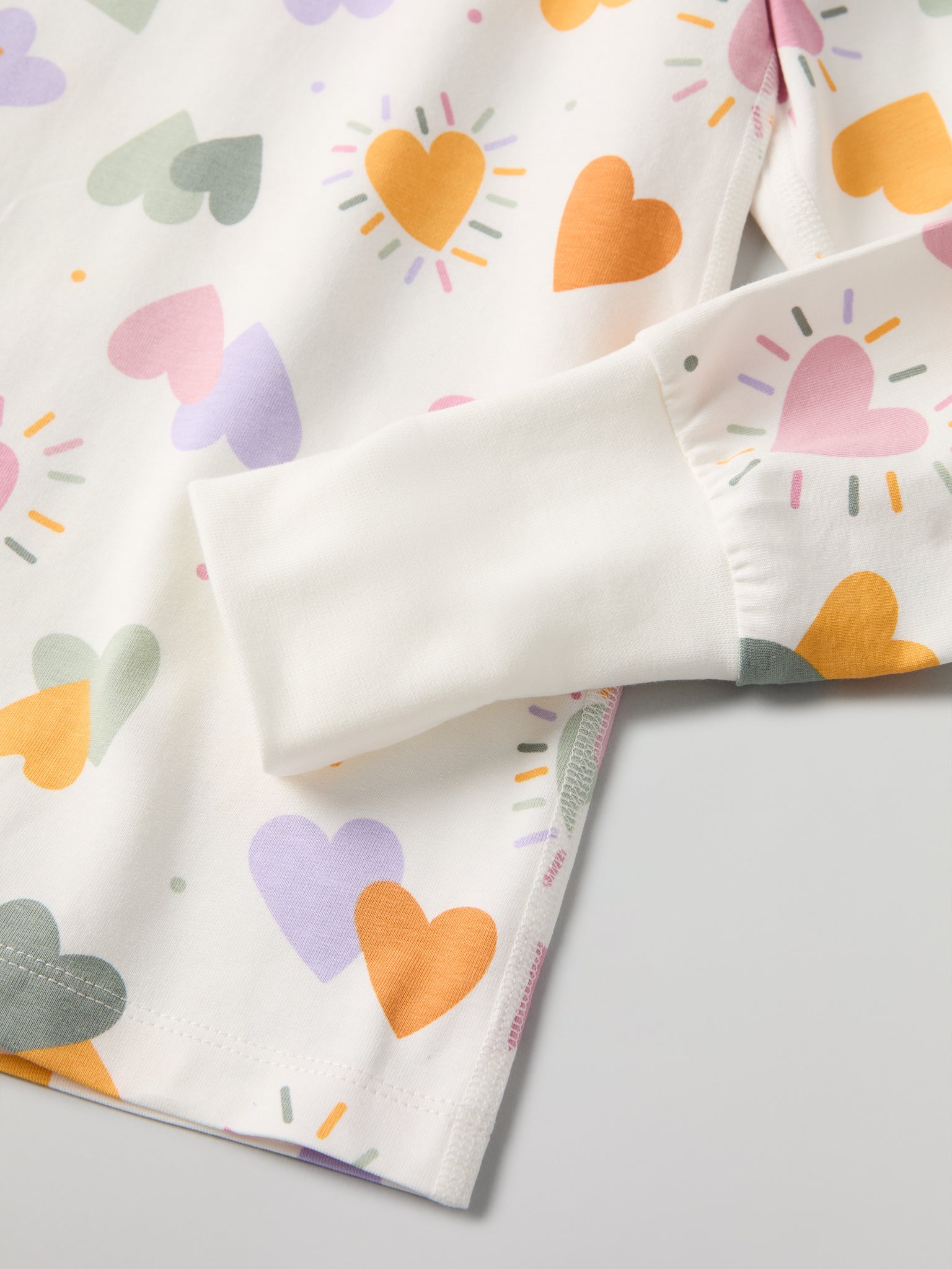 Heart Print Kids Pyjamas from Polarn O. Pyret kidswear. Clothes made using sustainably sourced materials.