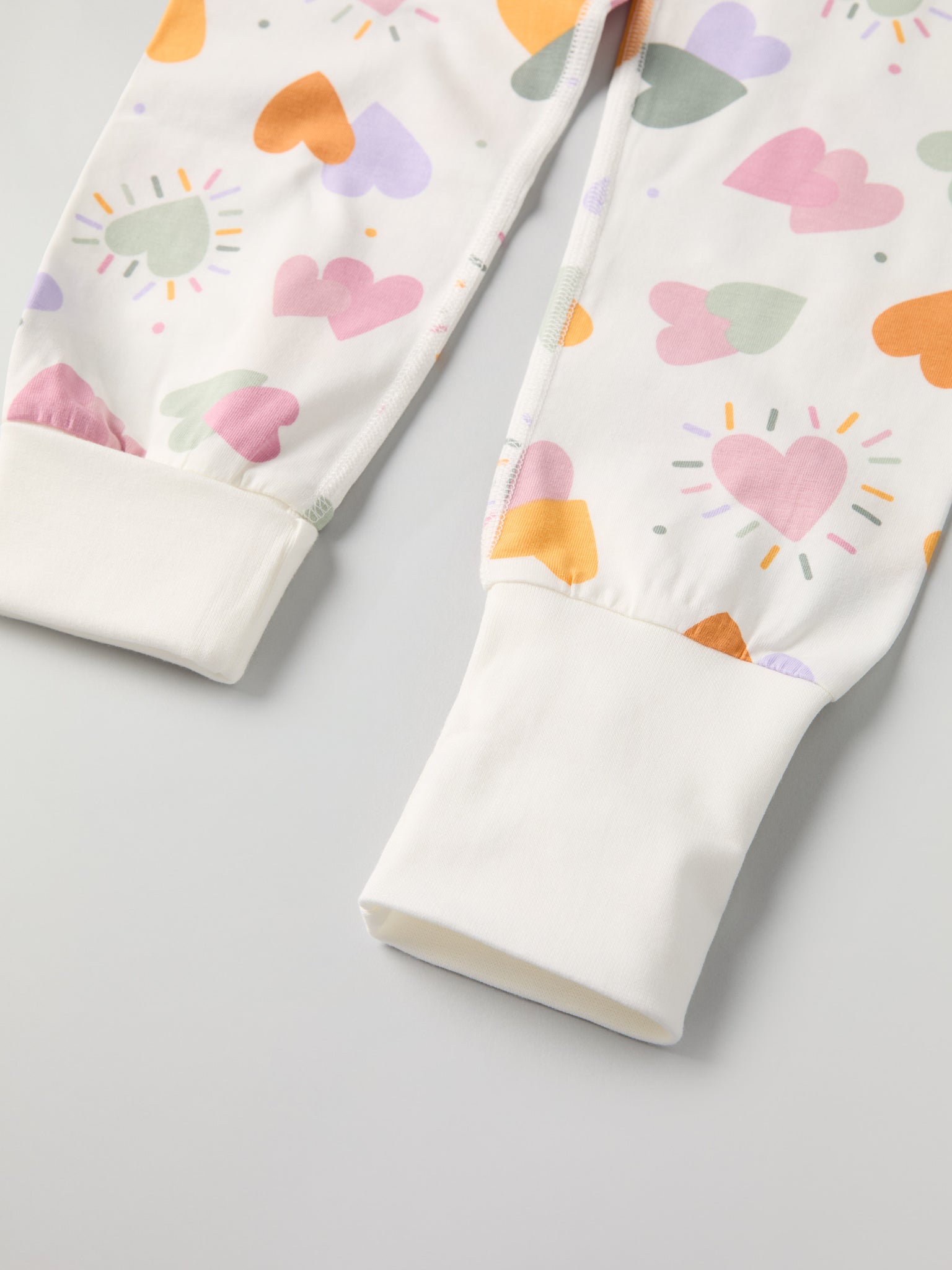 Heart Print Kids Pyjamas from Polarn O. Pyret kidswear. Clothes made using sustainably sourced materials.