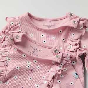 Floral Frilled Babygrow from the Polarn O. Pyret baby collection. Clothes made using sustainably sourced materials.