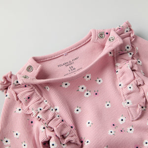 Floral Frilled Babygrow from the Polarn O. Pyret baby collection. Clothes made using sustainably sourced materials.