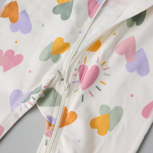 Heart Print Baby Sleepsuit from the Polarn O. Pyret baby collection. Ethically produced kids clothing.