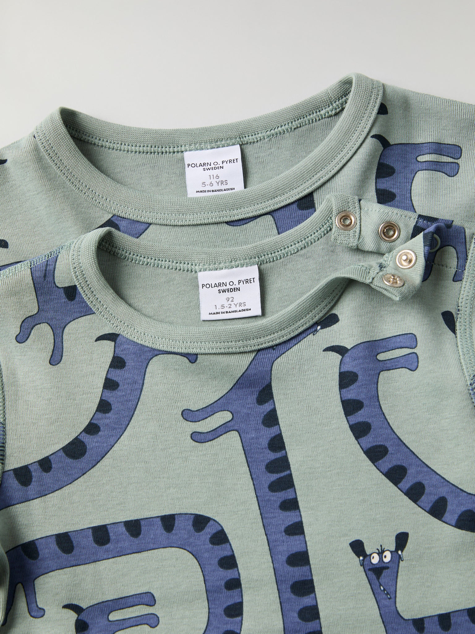 Dog Print Kids Top from Polarn O. Pyret kidswear. Clothes made using sustainably sourced materials.