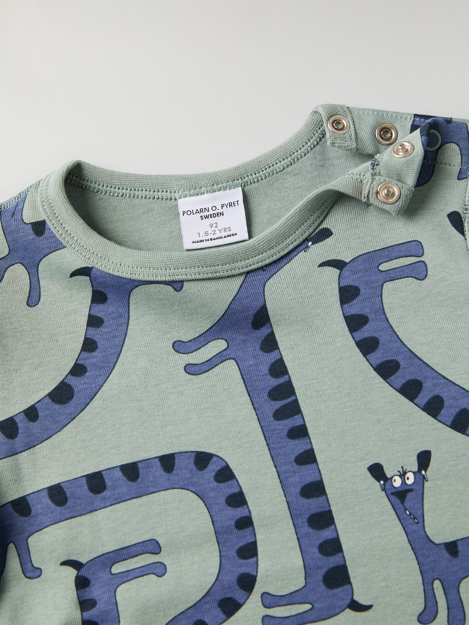 Dog Print Kids Top from Polarn O. Pyret kidswear. Clothes made using sustainably sourced materials.