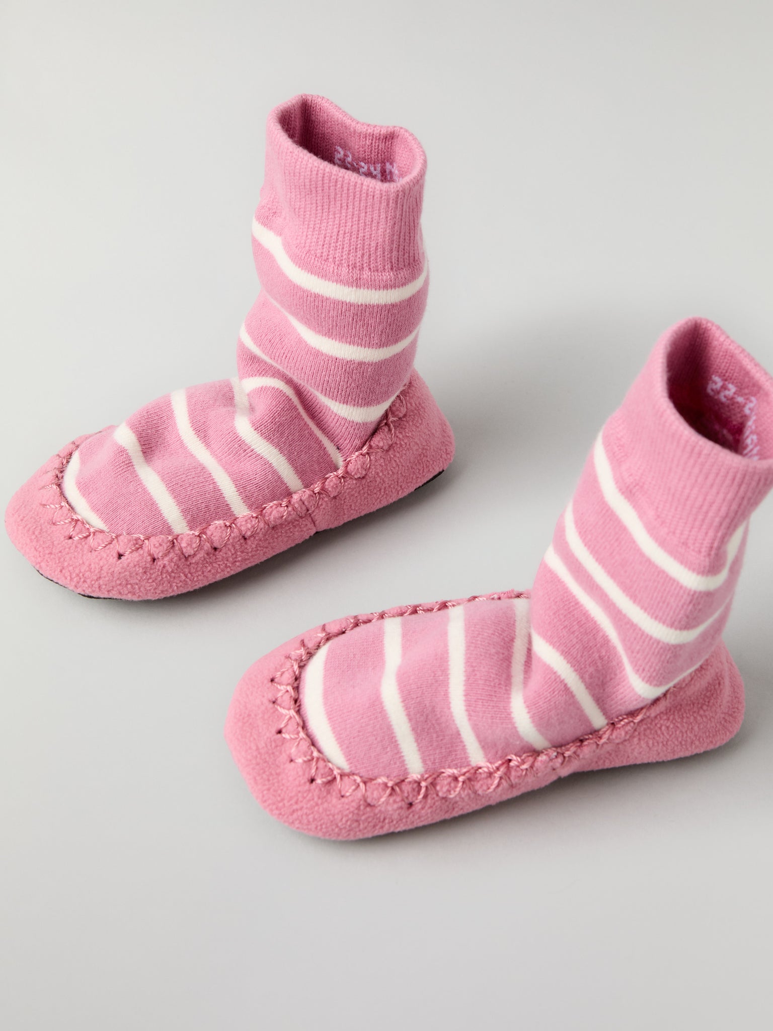 Pink Striped Kids Moccasins from Polarn O. Pyret kidswear. Clothes made using sustainably sourced materials.