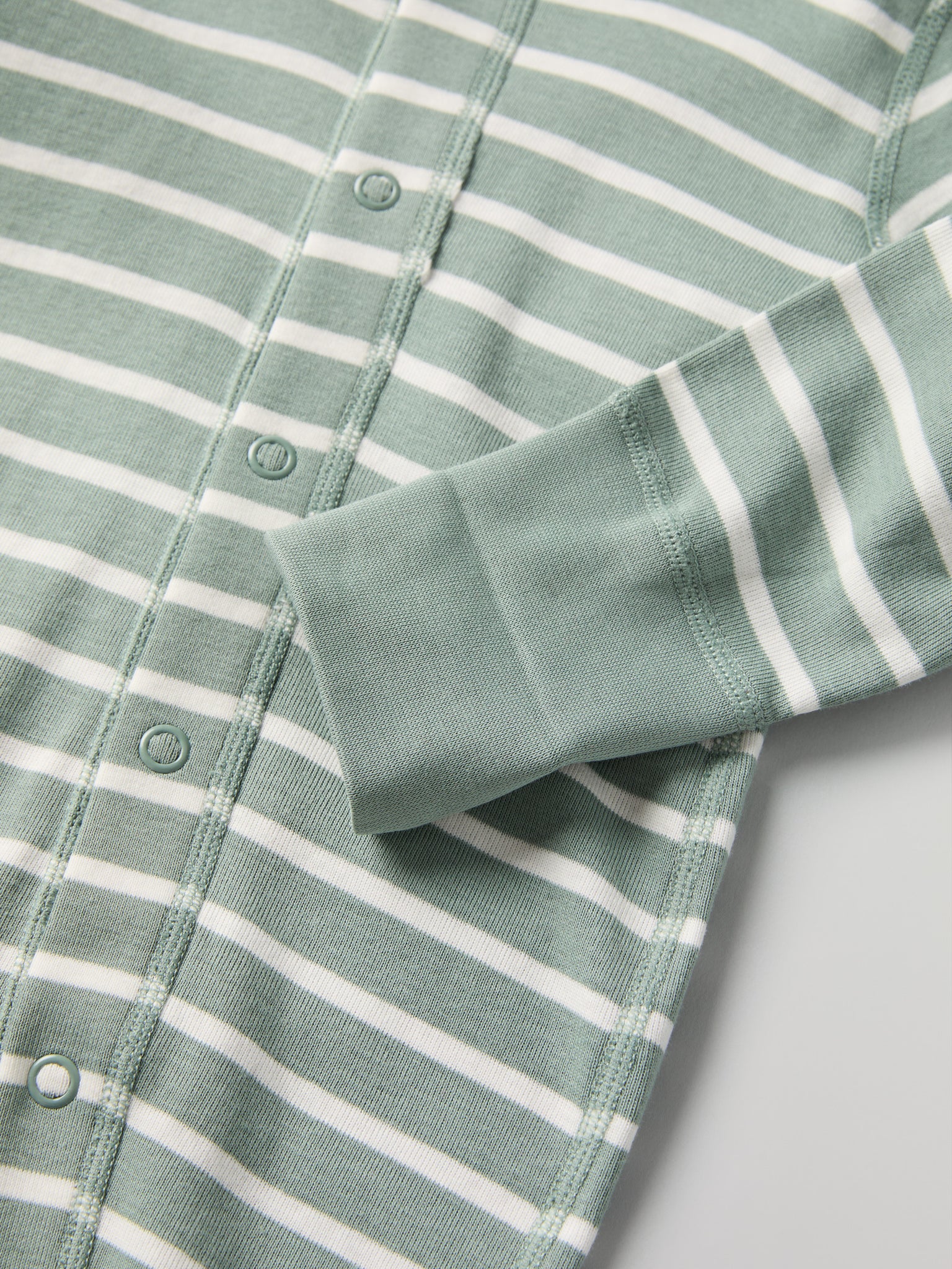 Green Striped Baby Romper from the Polarn O. Pyret baby collection. Clothes made using sustainably sourced materials.