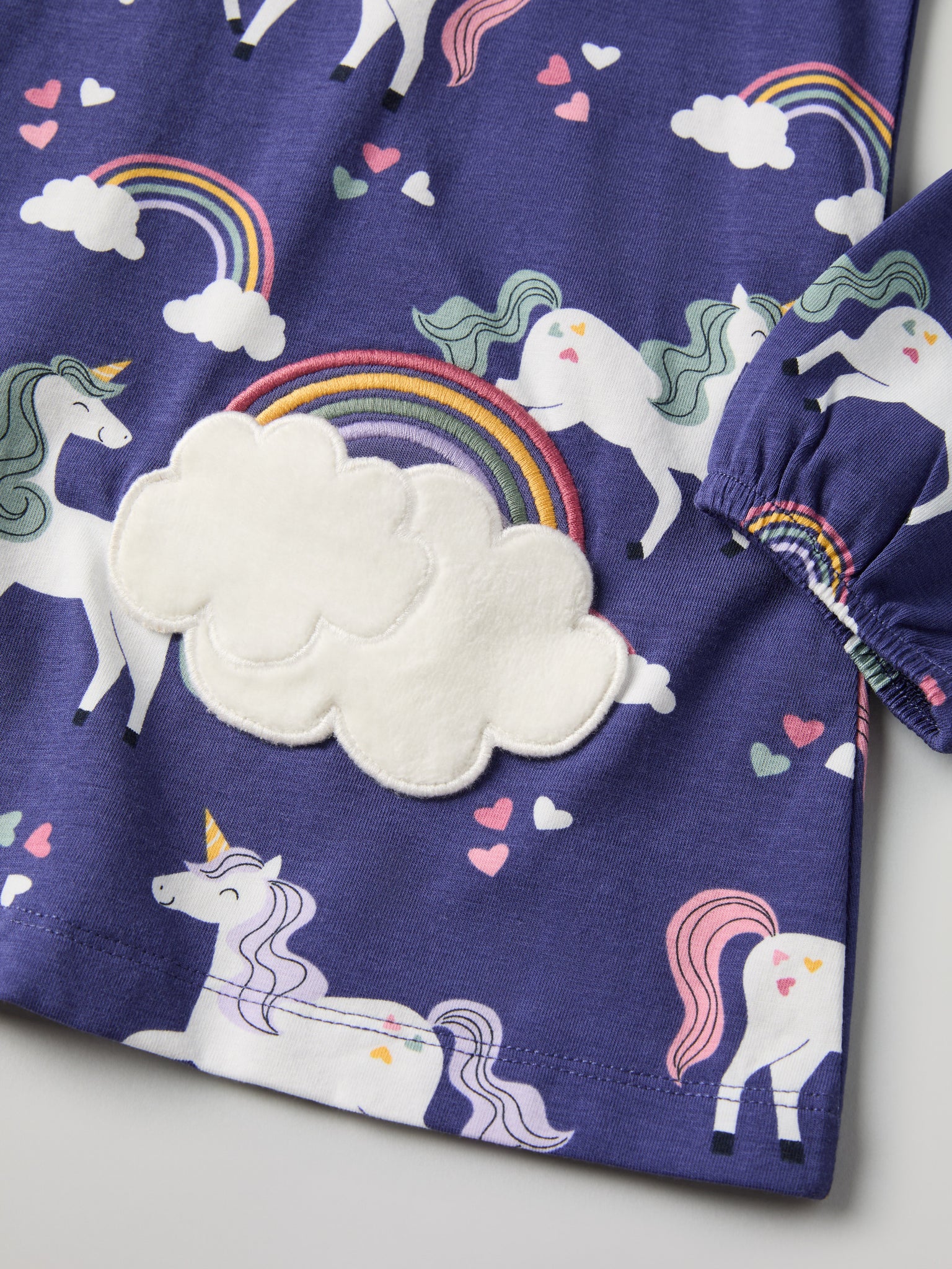 Unicorn Cloud Pocket Kids Top from Polarn O. Pyret kidswear. Nordic kids clothes made from sustainable sources.