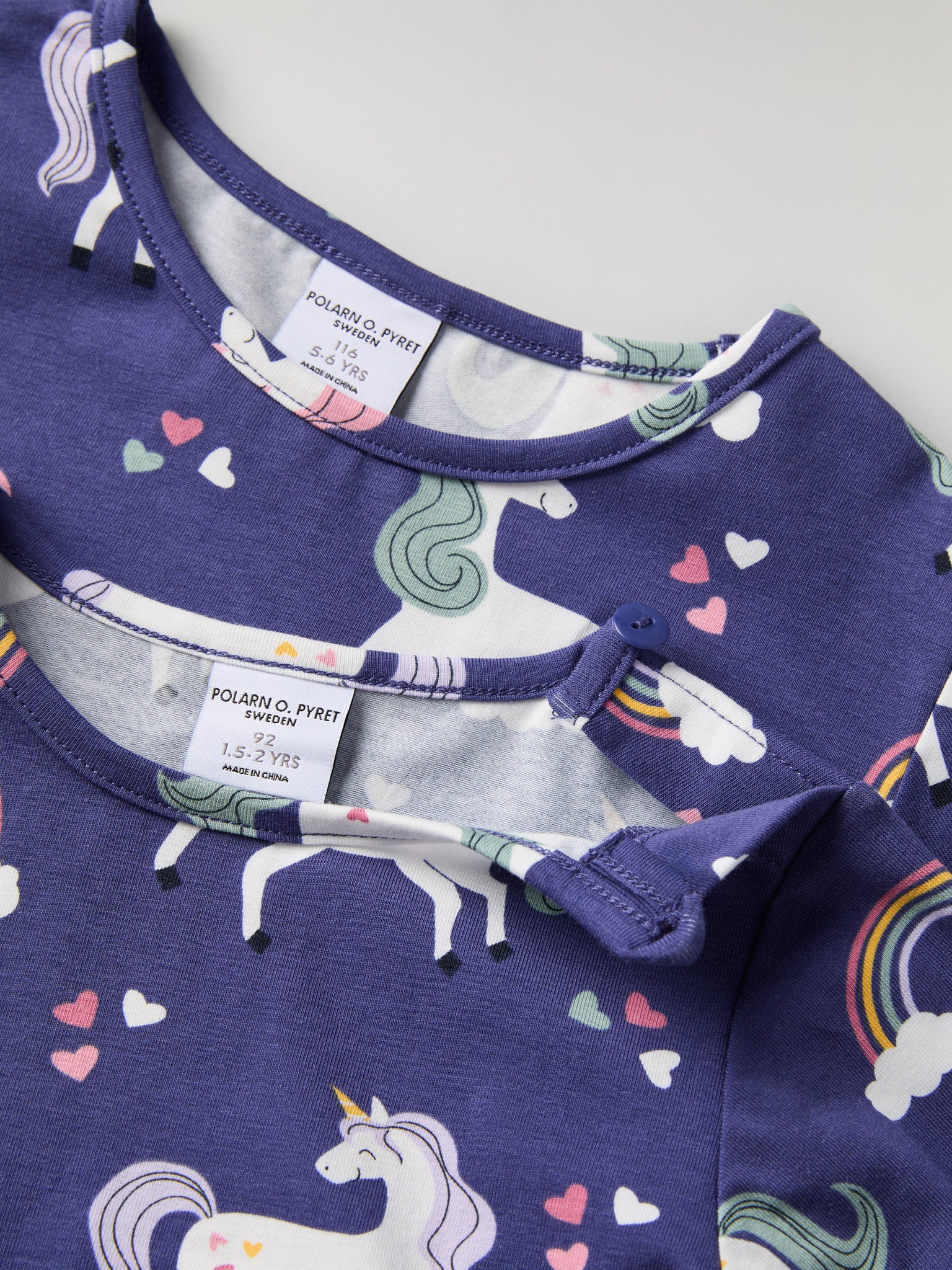 Unicorn Cloud Pocket Kids Top from Polarn O. Pyret kidswear. Nordic kids clothes made from sustainable sources.