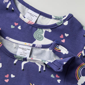 Unicorn Cloud Pocket Kids Top from Polarn O. Pyret kidswear. Nordic kids clothes made from sustainable sources.