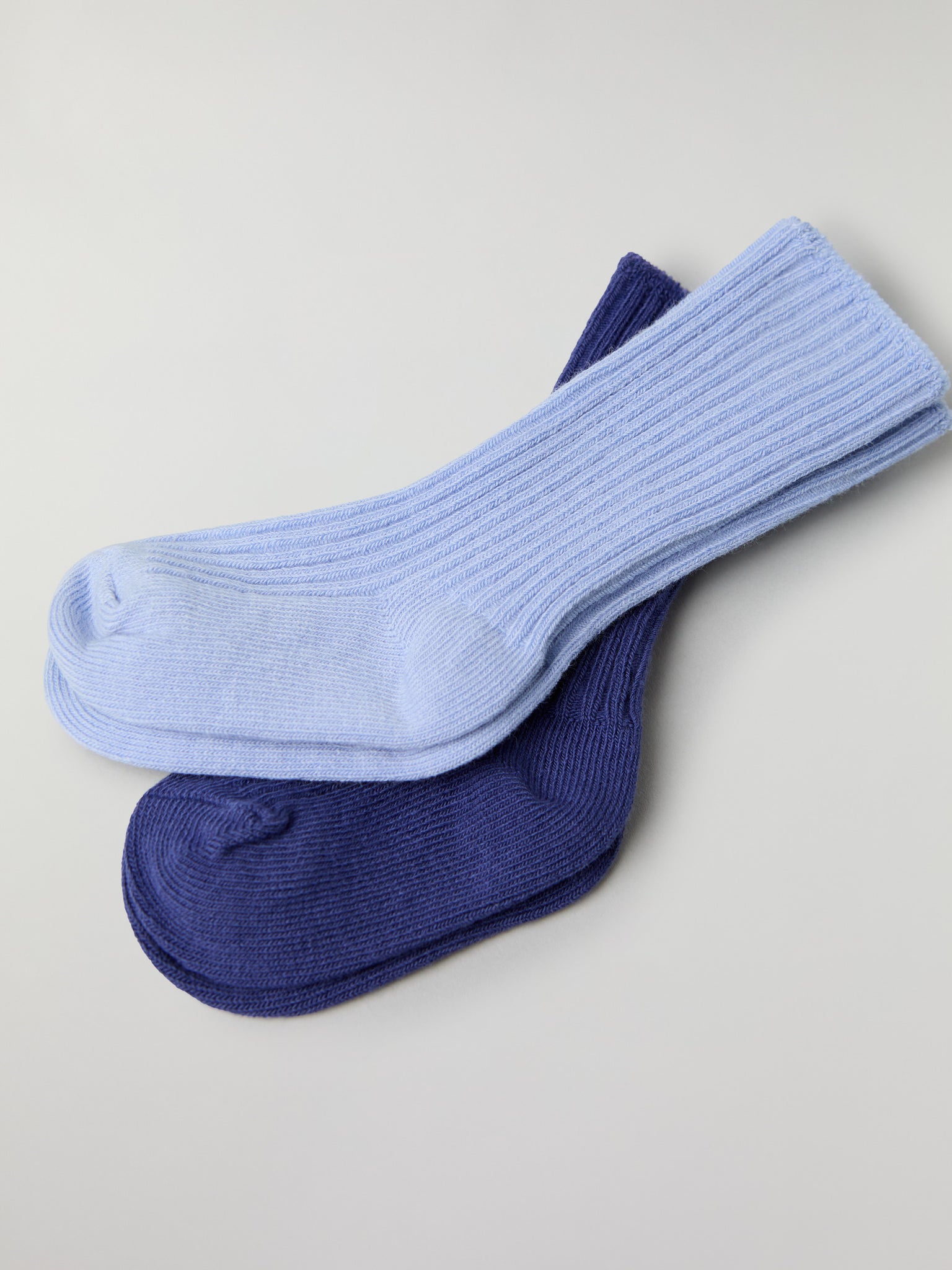 Two Pack Baby Socks in blue from the Polarn O. Pyret baby collection. Ethically produced kids clothing.