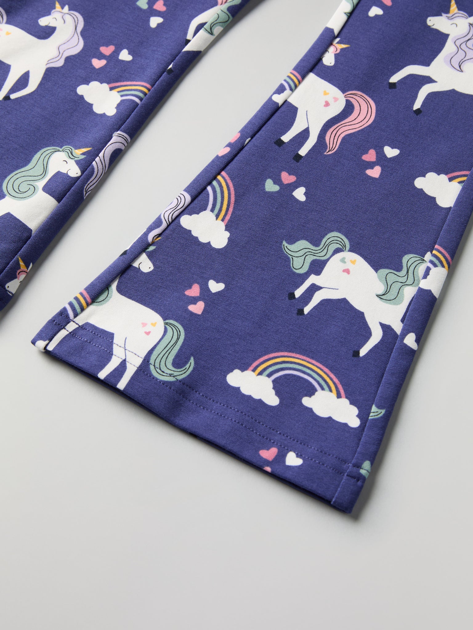 Unicorn Print flared Kids Joggers from Polarn O. Pyret kidswear. Clothes made using sustainably sourced materials.