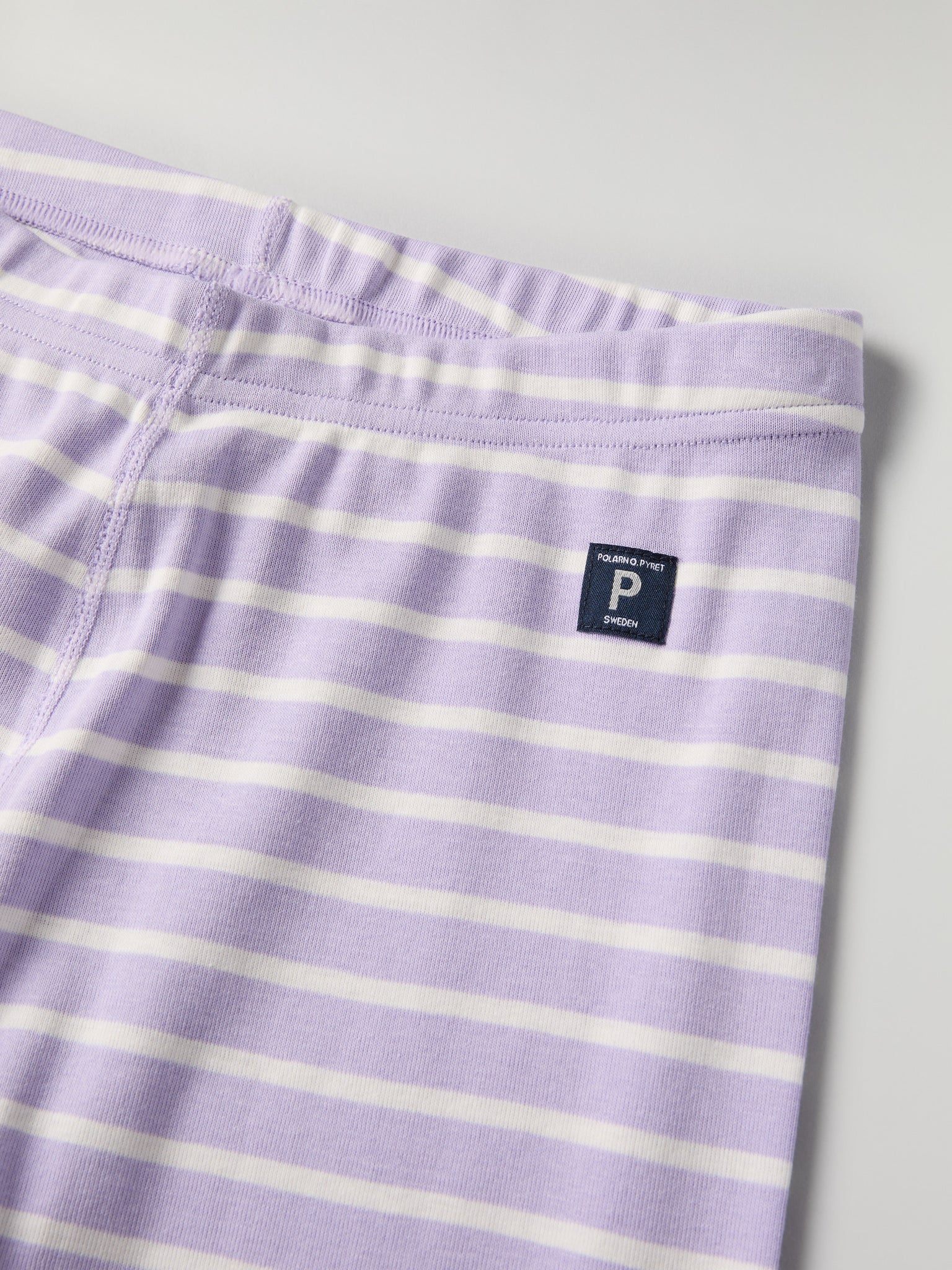 Purple Striped Adult Pyjamas from Polarn O. Pyret kidswear. Nordic kids clothes made from sustainable sources.