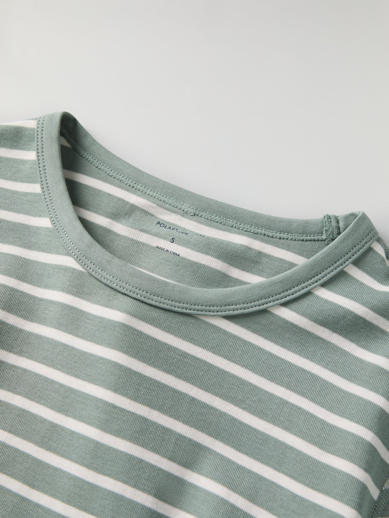 Green Striped Adult Pyjamas from Polarn O. Pyret kidswear. Clothes made using sustainably sourced materials.