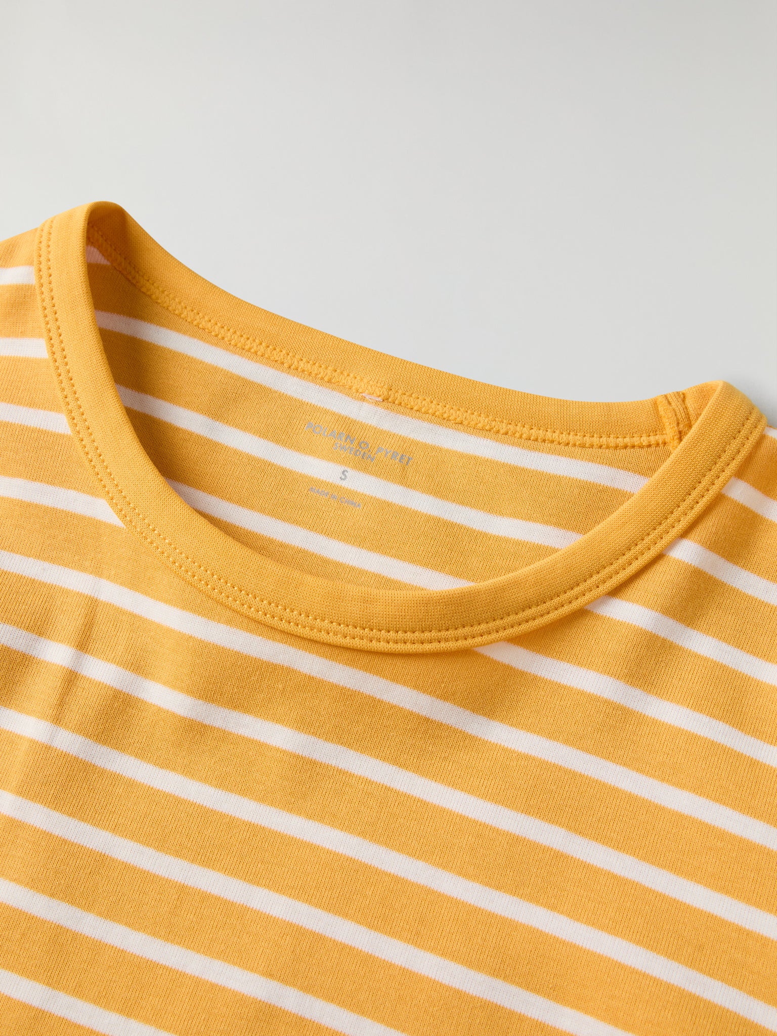 Yellow Striped Adult Pyjamas from Polarn O. Pyret kidswear. Clothes made using sustainably sourced materials.