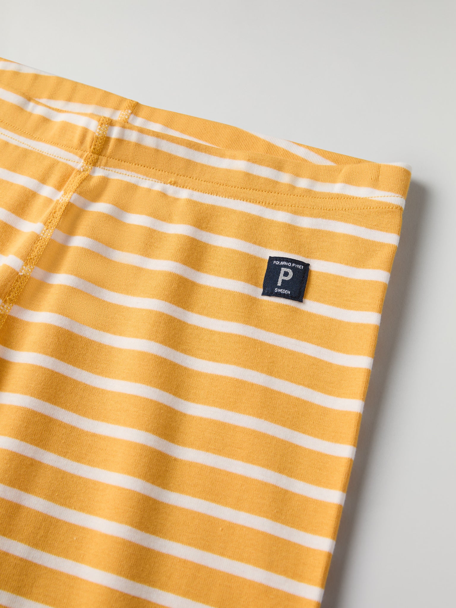 Yellow Striped Adult Pyjamas from Polarn O. Pyret kidswear. Clothes made using sustainably sourced materials.