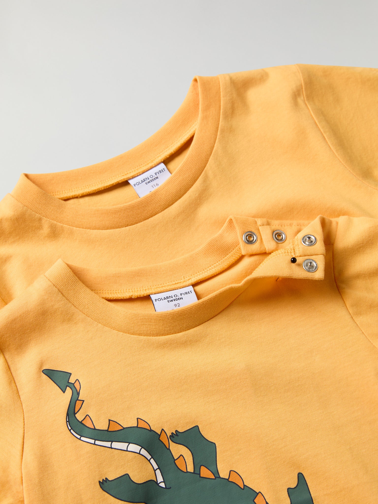 Organic Cotton Kids Dragon Print T-shirt from Polarn O. Pyret kidswear. Nordic kids clothes made from sustainable sources.