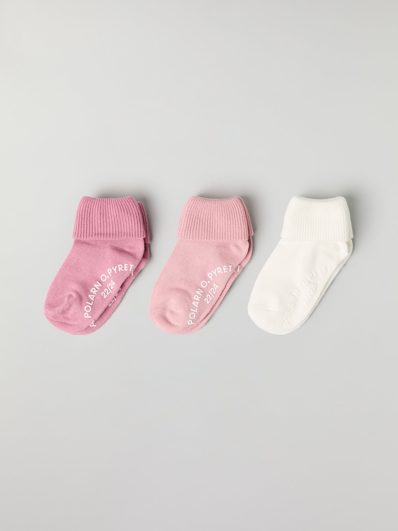 Three Pack Antislip Kids Socks from Polarn O. Pyret kidswear. Clothes made using sustainably sourced materials.