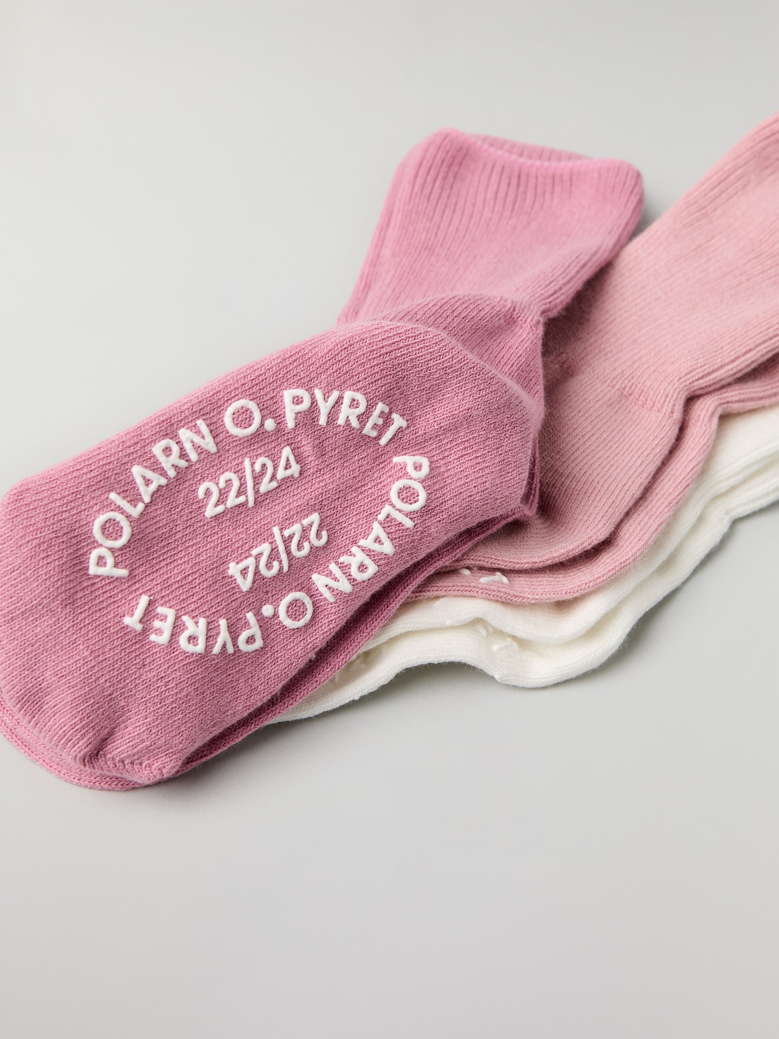 Three Pack Antislip Kids Socks from Polarn O. Pyret kidswear. Clothes made using sustainably sourced materials.