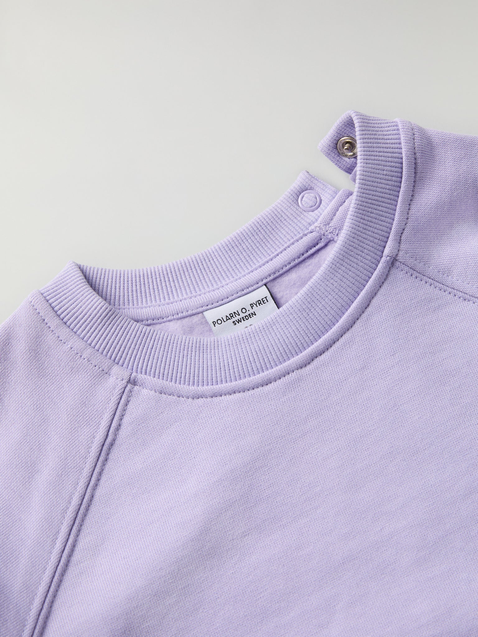 Purple Kids Sweatshirt from Polarn O. Pyret kidswear. Nordic kids clothes made from sustainable sources.