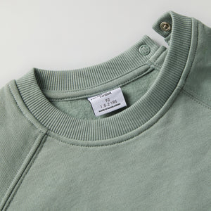 Green Kids Sweatshirt from Polarn O. Pyret kidswear. Clothes made using sustainably sourced materials.