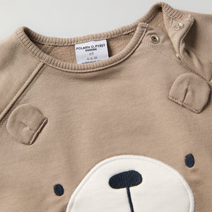 Bear Applique Baby Sweatshirt from the Polarn O. Pyret baby collection. Clothes made using sustainably sourced materials.