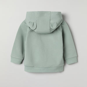 Green Baby Hoodie from the Polarn O. Pyret baby collection. Clothes made using sustainably sourced materials.