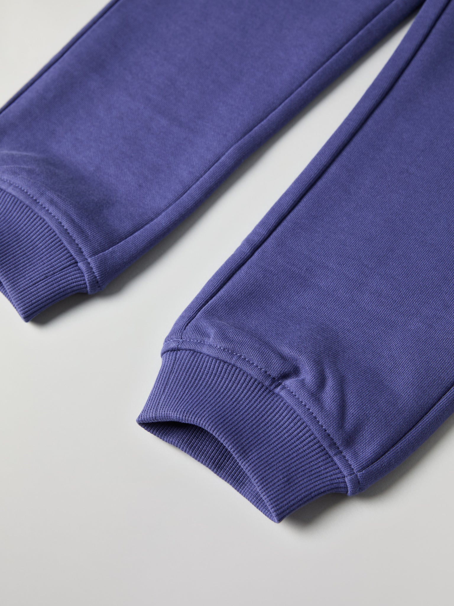 Blue Kids Joggers from Polarn O. Pyret kidswear. Nordic kids clothes made from sustainable sources.