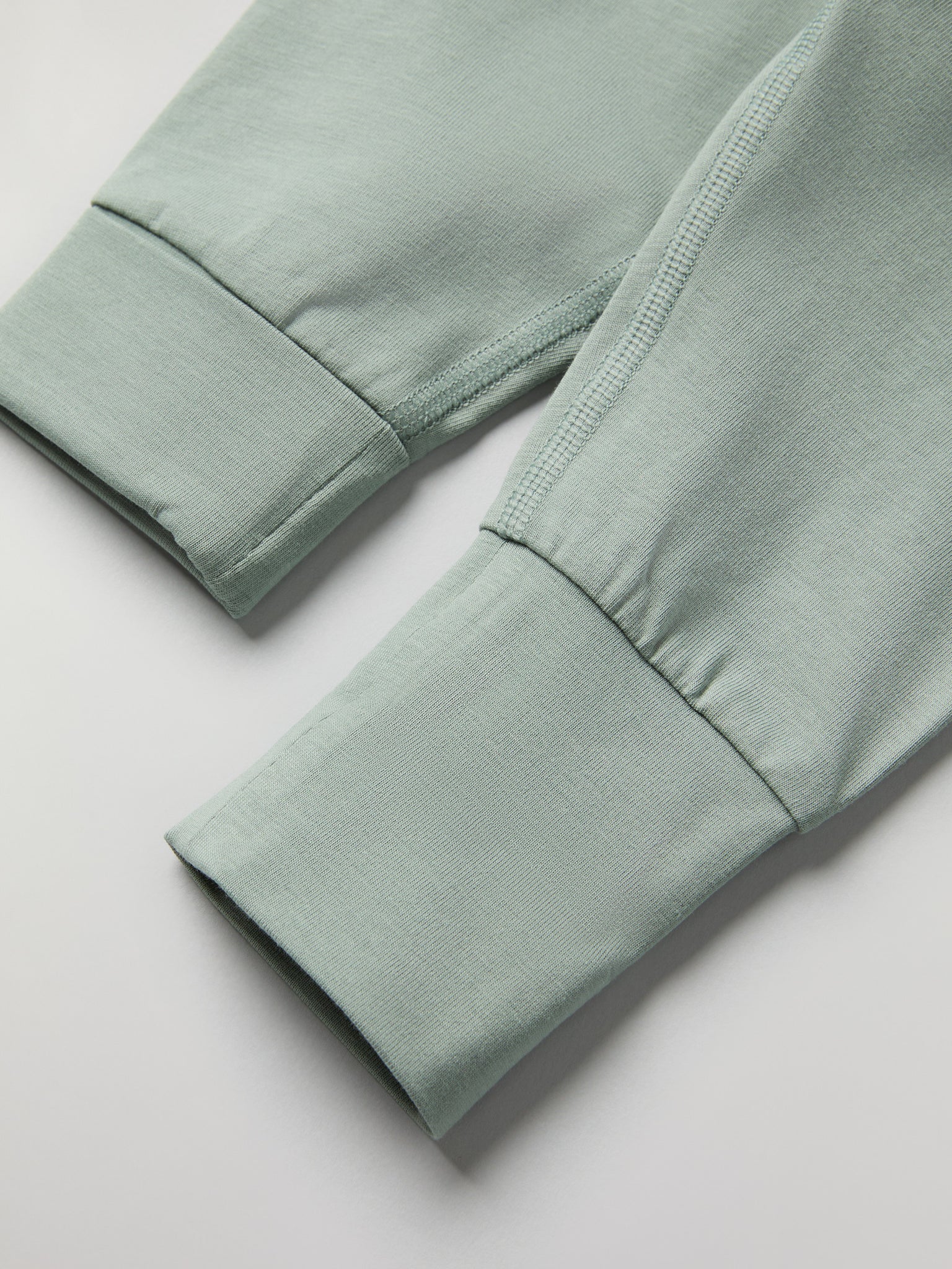 Green Soft Baby Leggings from the Polarn O. Pyret baby collection. Clothes made using sustainably sourced materials.