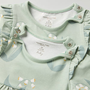 Lily Print Baby Dress from the Polarn O. Pyret baby collection. Clothes made using sustainably sourced materials.