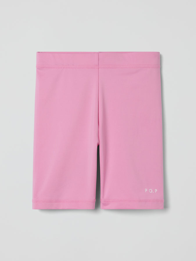 Pink UV Kids Swim Shorts from the Polarn O. Pyret baby collection. Nordic kids clothes made from sustainable sources.