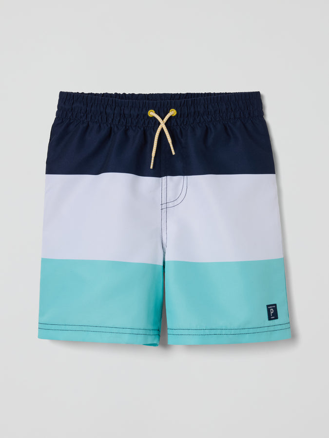 Block Colour Kids Swim Shorts from the Polarn O. Pyret baby collection. Nordic kids clothes made from sustainable sources.