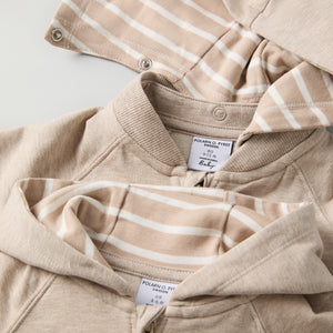 Beige Baby Hoodie from the Polarn O. Pyret baby collection. Nordic kids clothes made from sustainable sources.