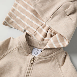 Beige Baby Hoodie from the Polarn O. Pyret baby collection. Nordic kids clothes made from sustainable sources.