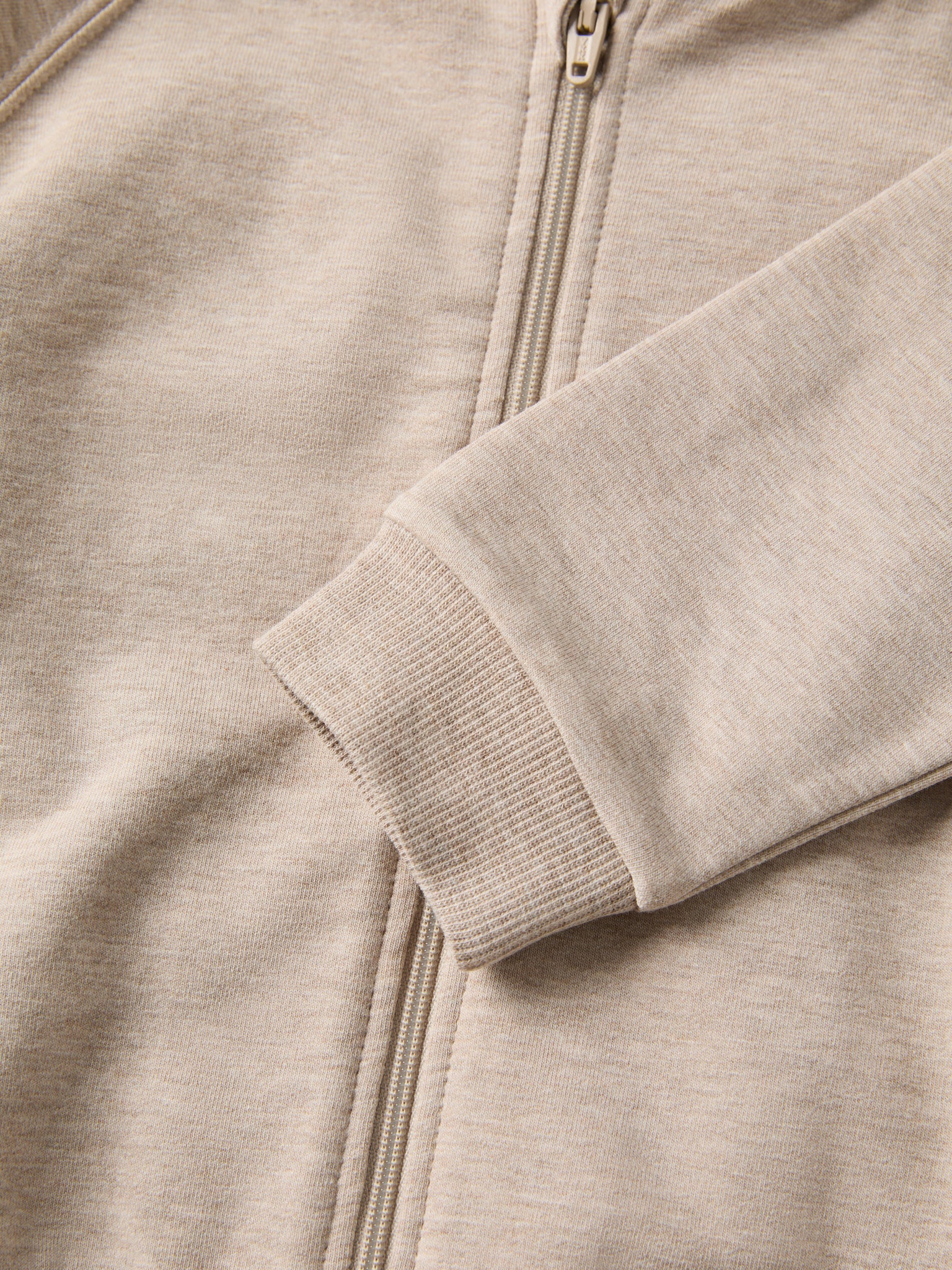 Beige Baby Hoodie from the Polarn O. Pyret baby collection. Nordic kids clothes made from sustainable sources.