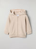 Beige Baby Hoodie from the Polarn O. Pyret baby collection. Nordic kids clothes made from sustainable sources.